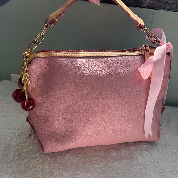 Dooney & Bourke Handbags - SOLD !!!!!! Shoulder Bag with Gold Details